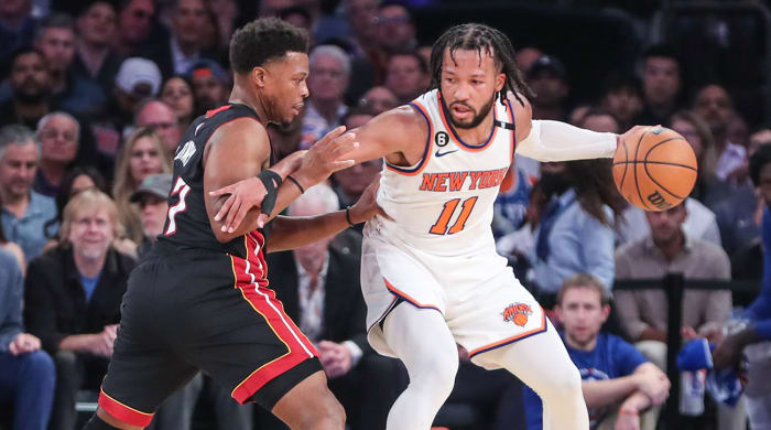 Knicks’ Jalen Brunson posts up Heat’s Kyle Lowry.